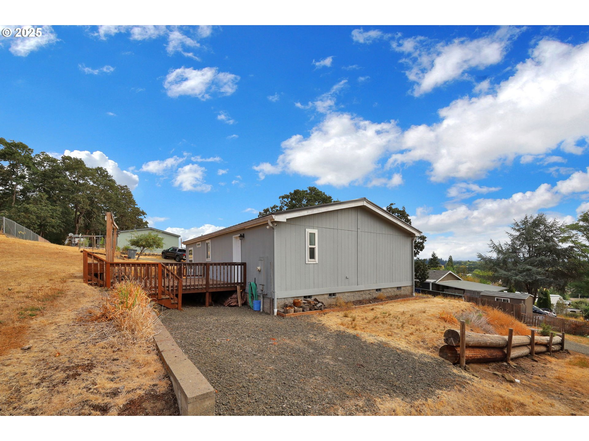 991 Main Street Monroe, OR 97456 - Photo 33 of 48 a view of a house with a yard