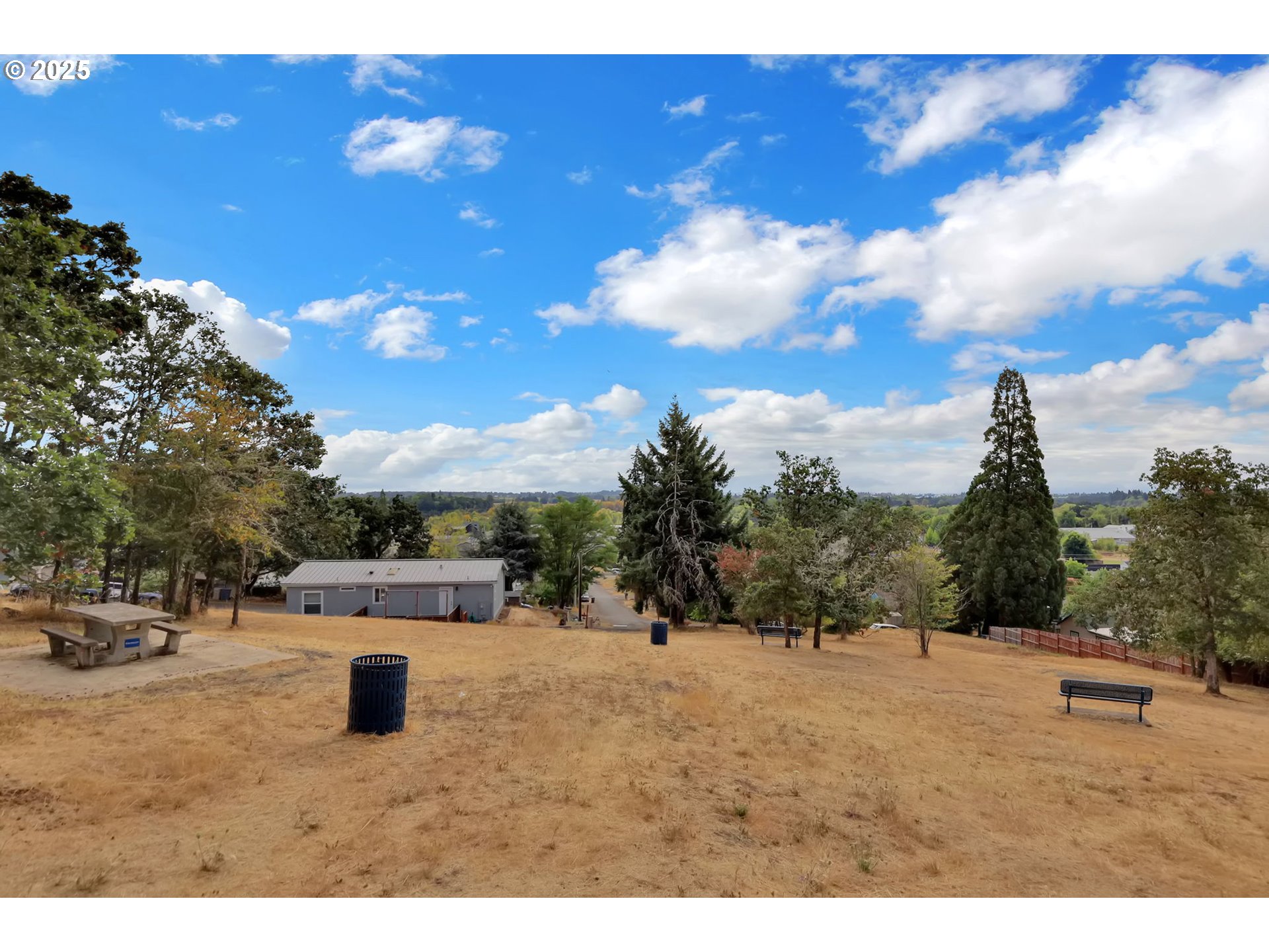 991 Main Street Monroe, OR 97456 - Photo 40 of 48 a view of outdoor space with swimming pool and trees