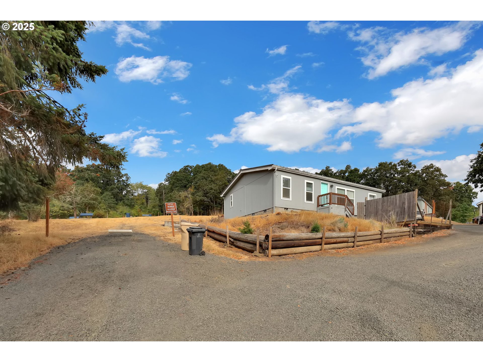 991 Main Street Monroe, OR 97456 - Photo 4 of 48 a view of a house with a yard