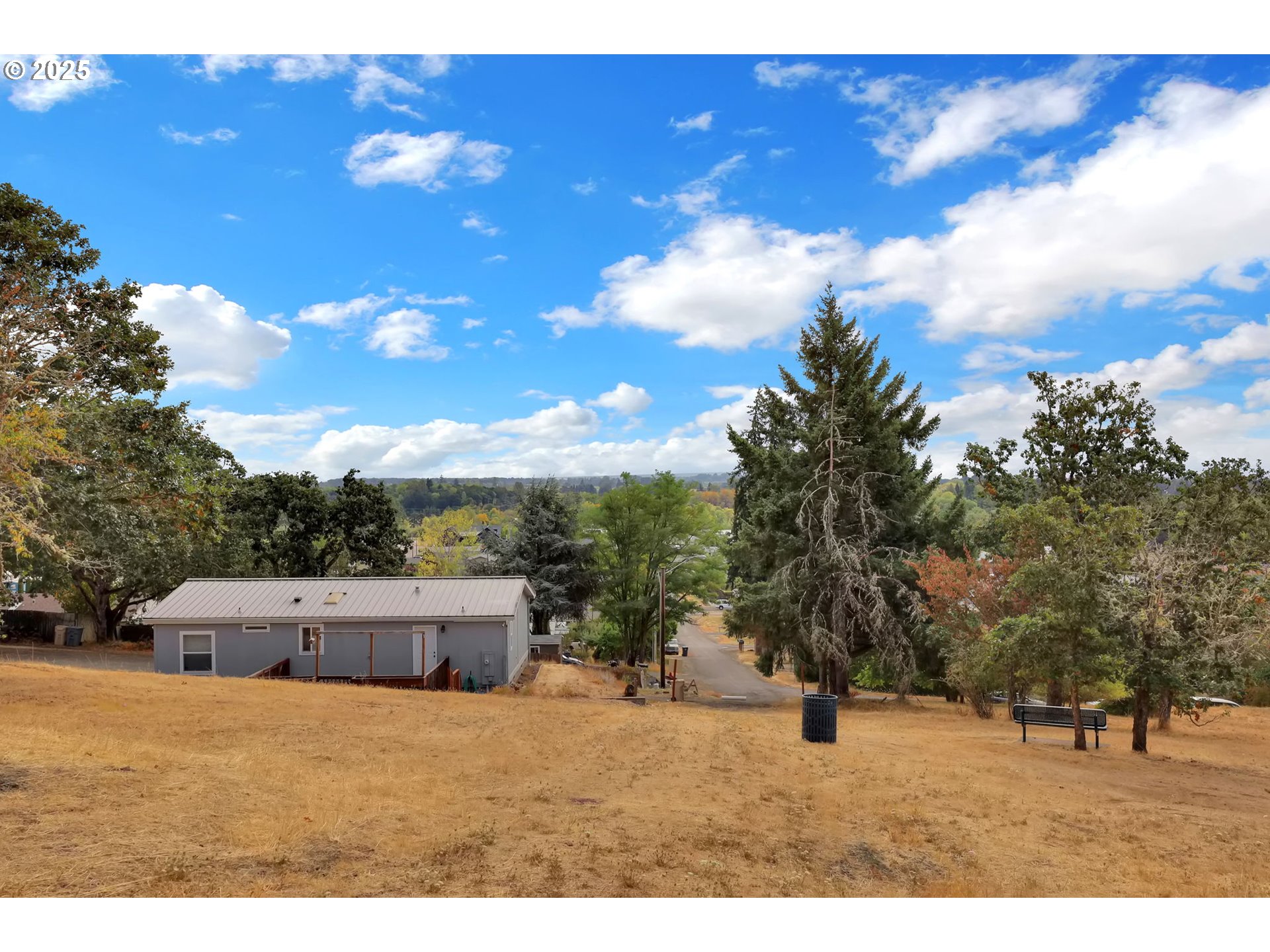 991 Main Street Monroe, OR 97456 - Photo 41 of 48 a backyard of a house with table and chairs