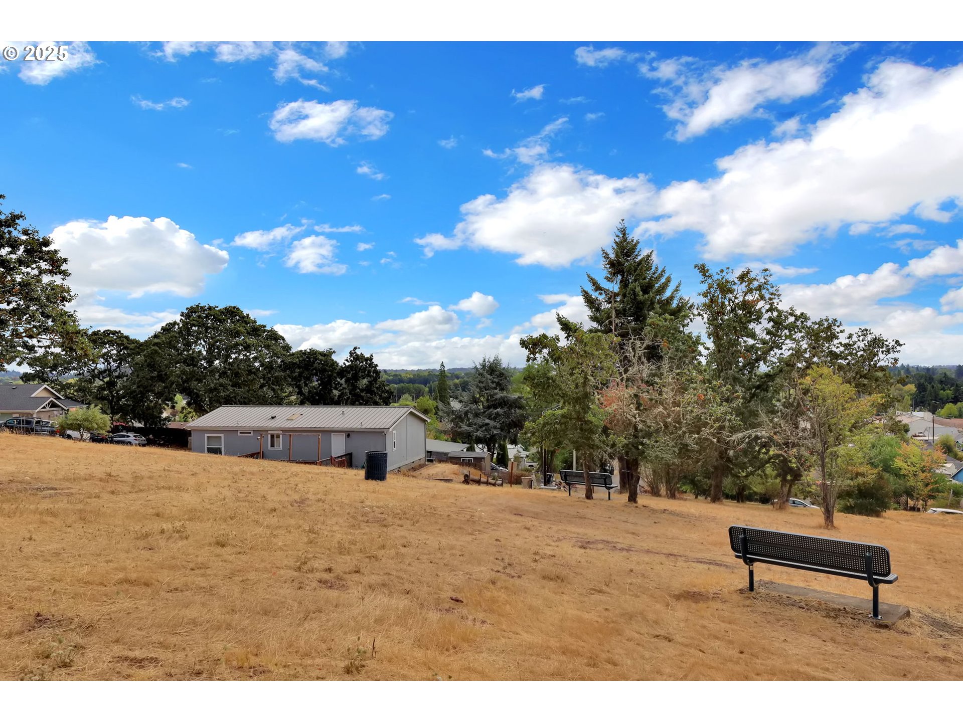 991 Main Street Monroe, OR 97456 - Photo 42 of 48 a view of a outdoor space with a house in the background