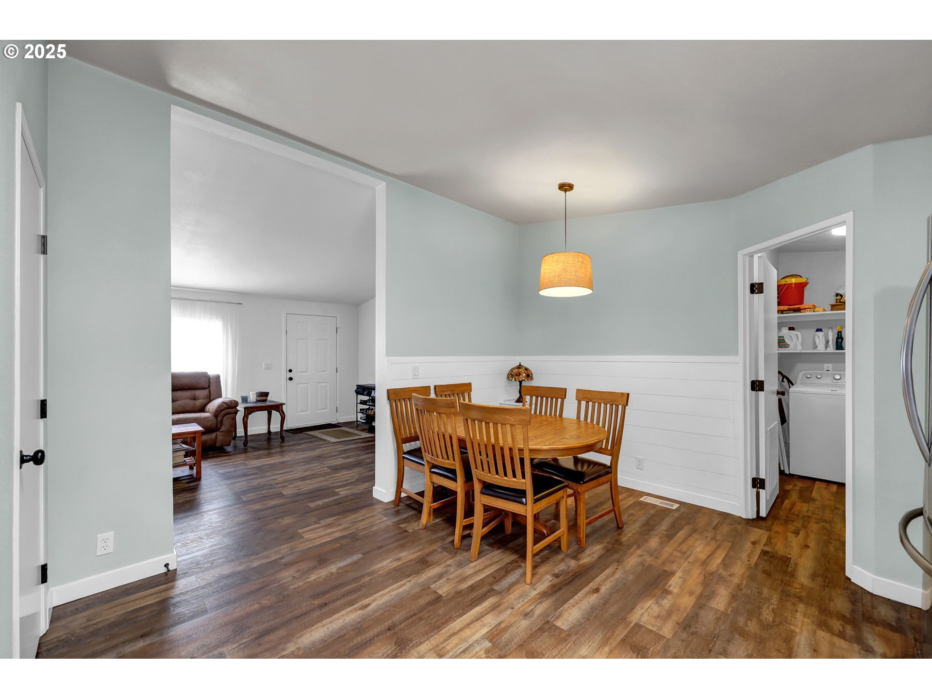 991 Main Street Monroe, OR 97456 - Photo 9 of 48 a view of a dining room with furniture and wooden floor