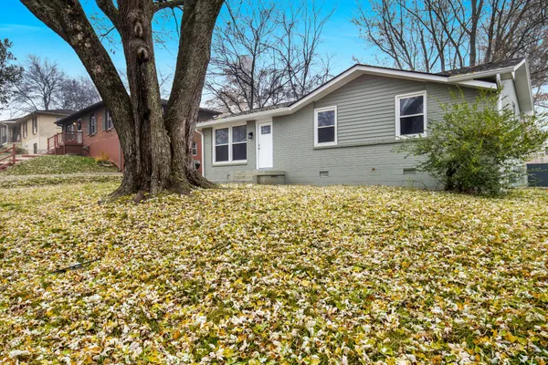a house with trees in front of it