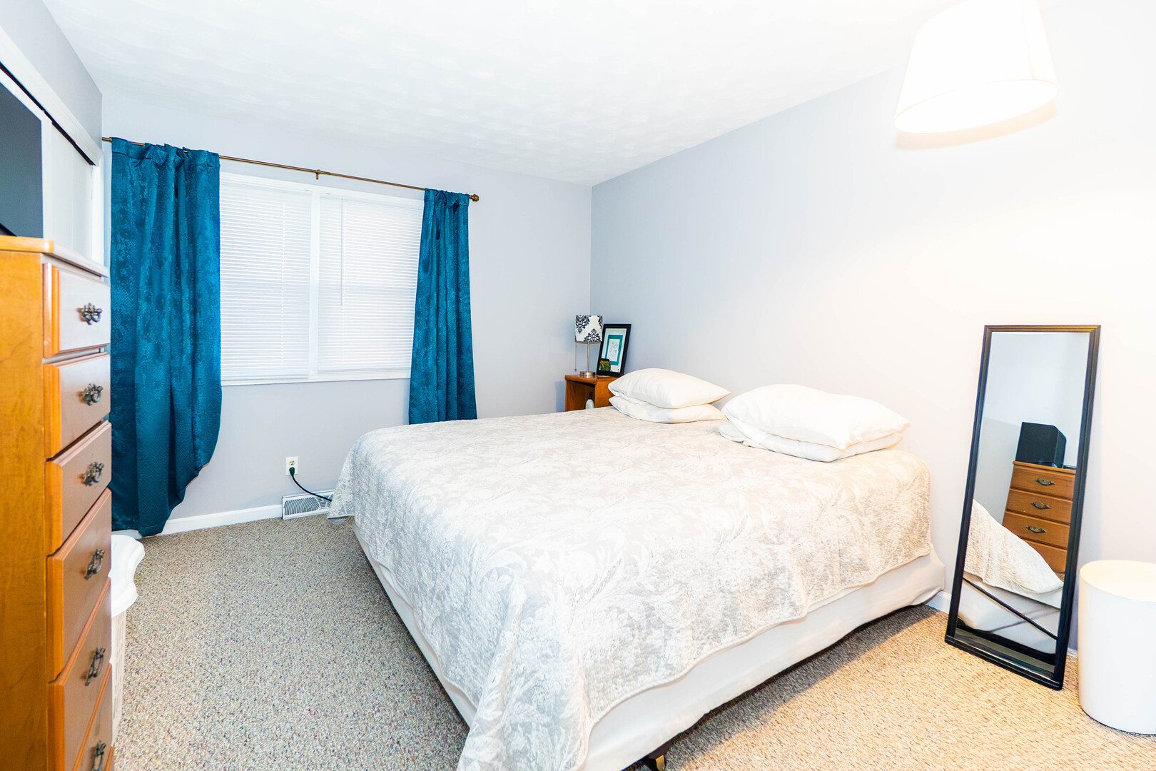 Undisclosed Address Rochelle, IL 61068 - Photo 11 of 22 a bedroom with a bed and a window