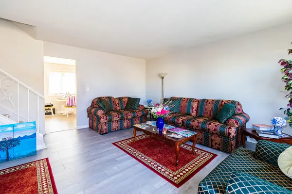 a living room with furniture and a couch
