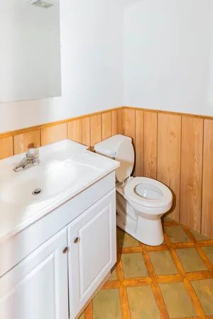 a bathroom with a sink and a toilet