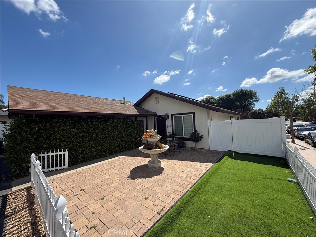 41880 6th Street Temecula, CA 92590 - Photo 4 of 8 a front view of a house with patio