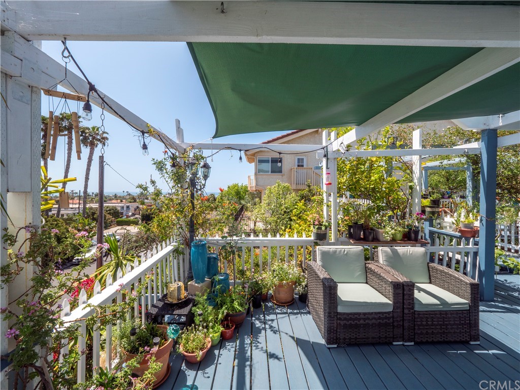 33881 Orilla Road Dana Point, CA 92629 - Photo 15 of 37 a view of a chairs and table in the balcony