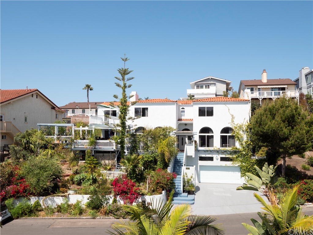 33881 Orilla Road Dana Point, CA 92629 - Photo 4 of 37 a picture of houses with street view