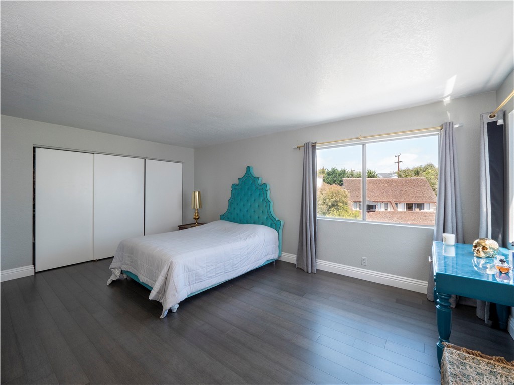 33881 Orilla Road Dana Point, CA 92629 - Photo 34 of 37 a spacious bedroom with a bed and a window