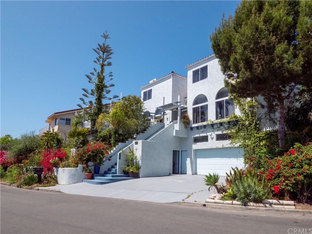 33881 Orilla Road Dana Point, CA 92629 - Photo 5 of 37 front view of a house with a street