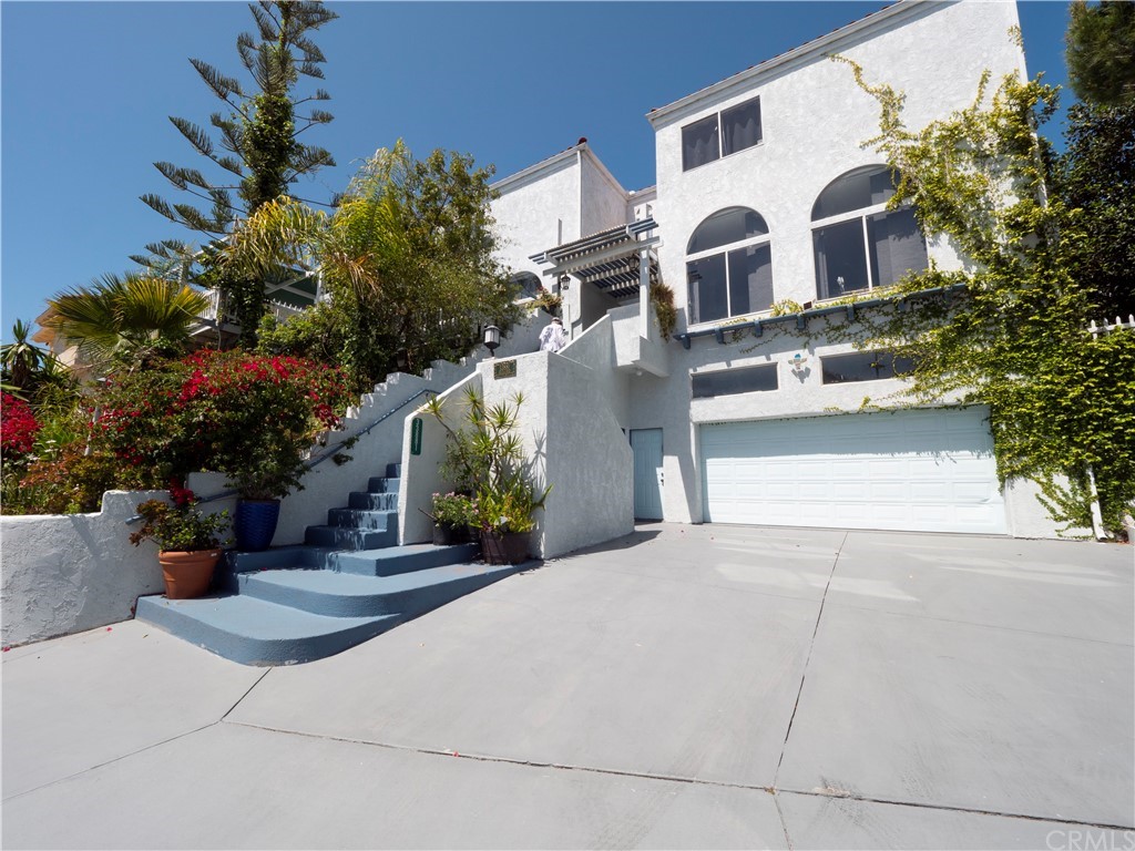 33881 Orilla Road Dana Point, CA 92629 - Photo 6 of 37 a front view of a house with a yard