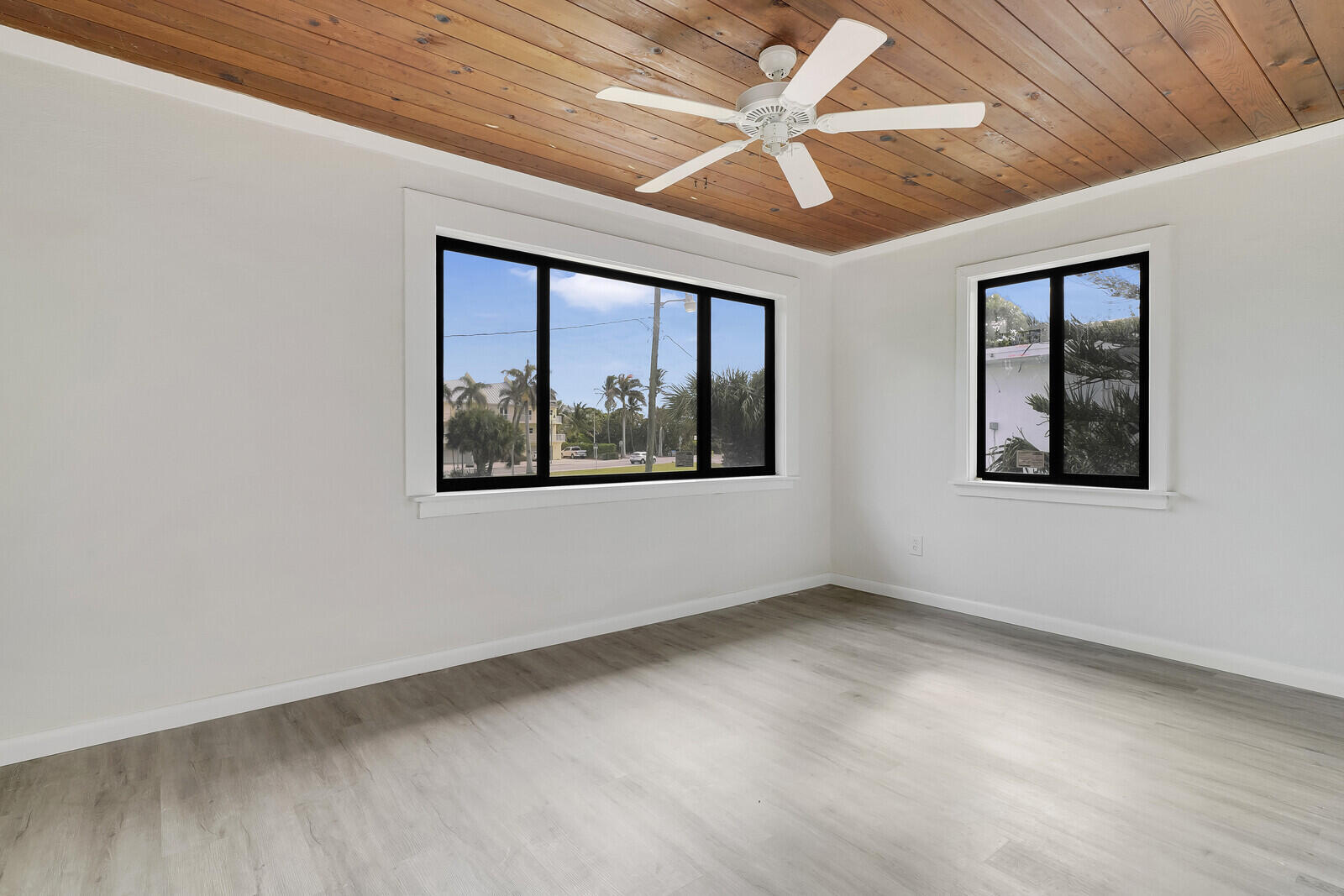 652 Hernando Street, Unit E Fort Pierce, FL 34949 - Photo 17 of 21 an empty room with windows