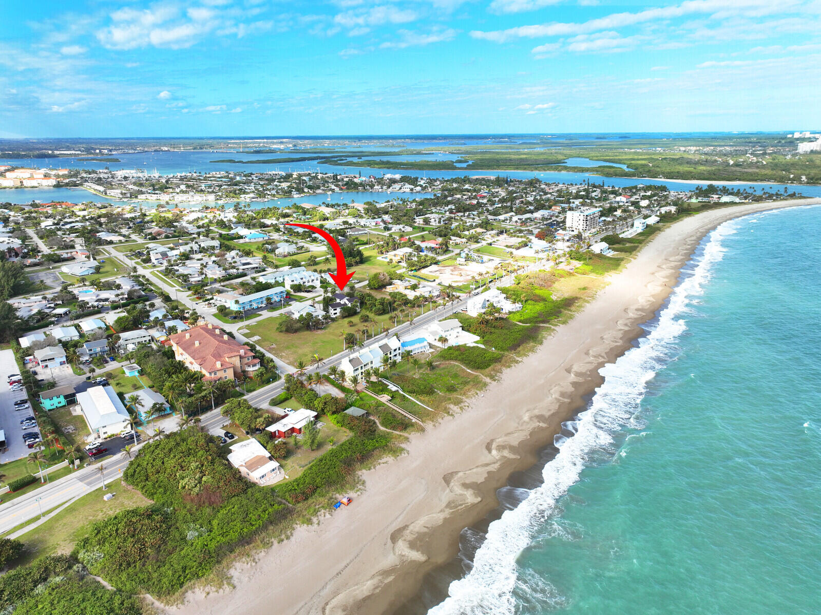 652 Hernando Street, Unit E Fort Pierce, FL 34949 - Photo 9 of 21 a view of a city with an ocean