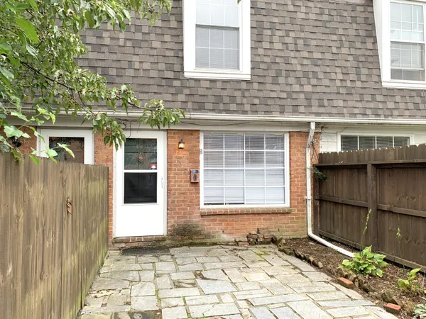 a front view of a house with a garage