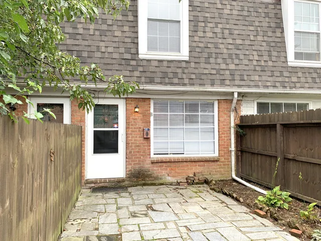 a front view of a house with a garage