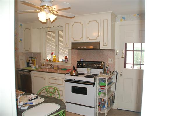 41 Leicester Road Marblehead, MA 01945 - Photo 6 of 13 a kitchen with stainless steel appliances granite countertop a white cabinets a stove a oven and a dining table