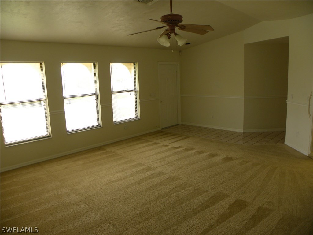 8381 Grove Road Fort Myers, FL 33967 - Photo 3 of 22 a view of an empty room with a window
