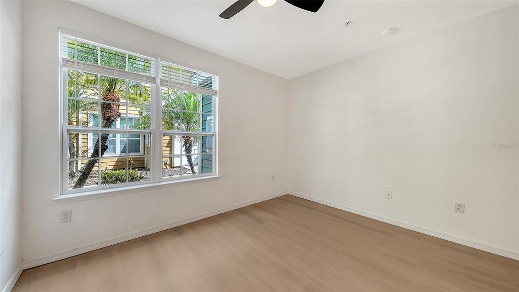 5561 Rosehill Road, Unit 104 Sarasota, FL 34233 - Photo 22 of 53 an empty room with a window