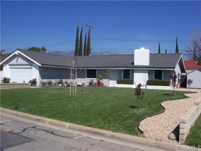 1227 Belle Road Calimesa, CA 92320 - Photo 1 of 1 BEAUTIFUL GREEN FRONT LAWN, WITH NEWLY PLANTED TREES