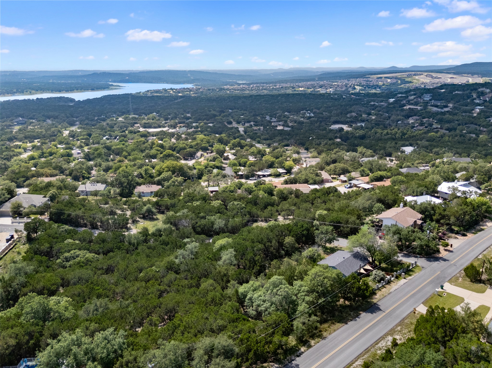 21105 Ridgeview Road Lago Vista, TX 78645 - Photo 16 of 34 Panoramic vista showcases verdant landscapes, serene waterways, and a vibrant community.