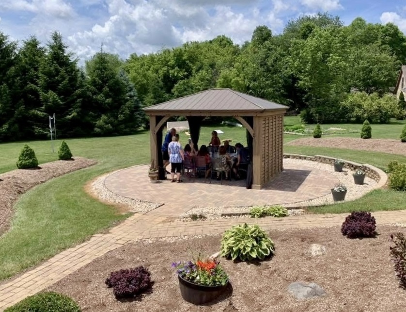 2303 Fox Bluff Lane Spring Grove, IL 60081 - Photo 37 of 39 a view of a garden with an outdoor seating