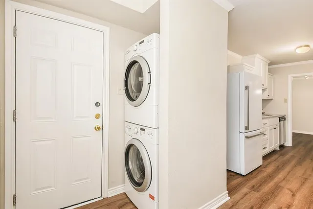 a utility room with dryer and washer
