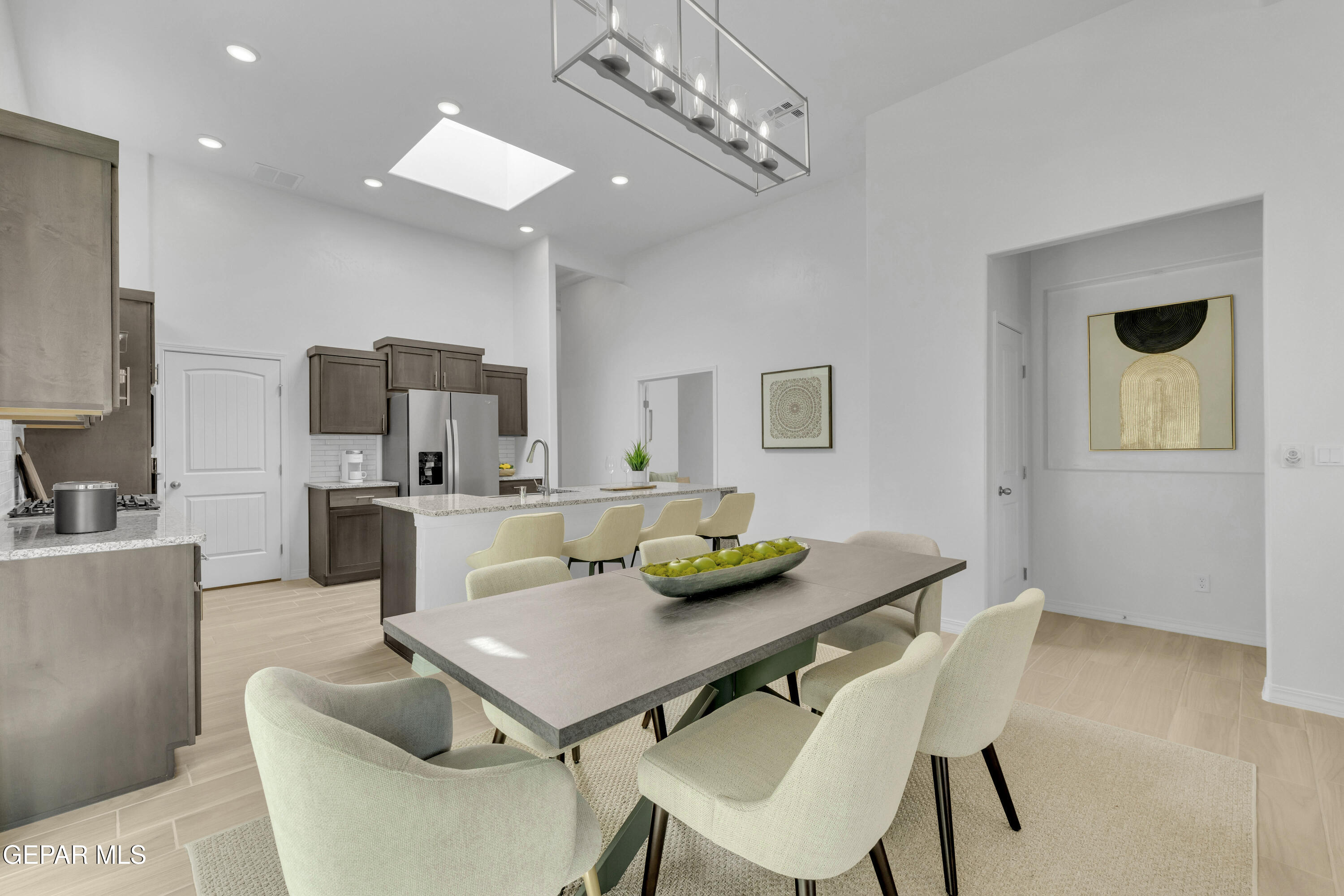 15300 Conviction El Paso, TX 79938 - Photo 20 of 44 a view of a dining room with furniture and wooden floor