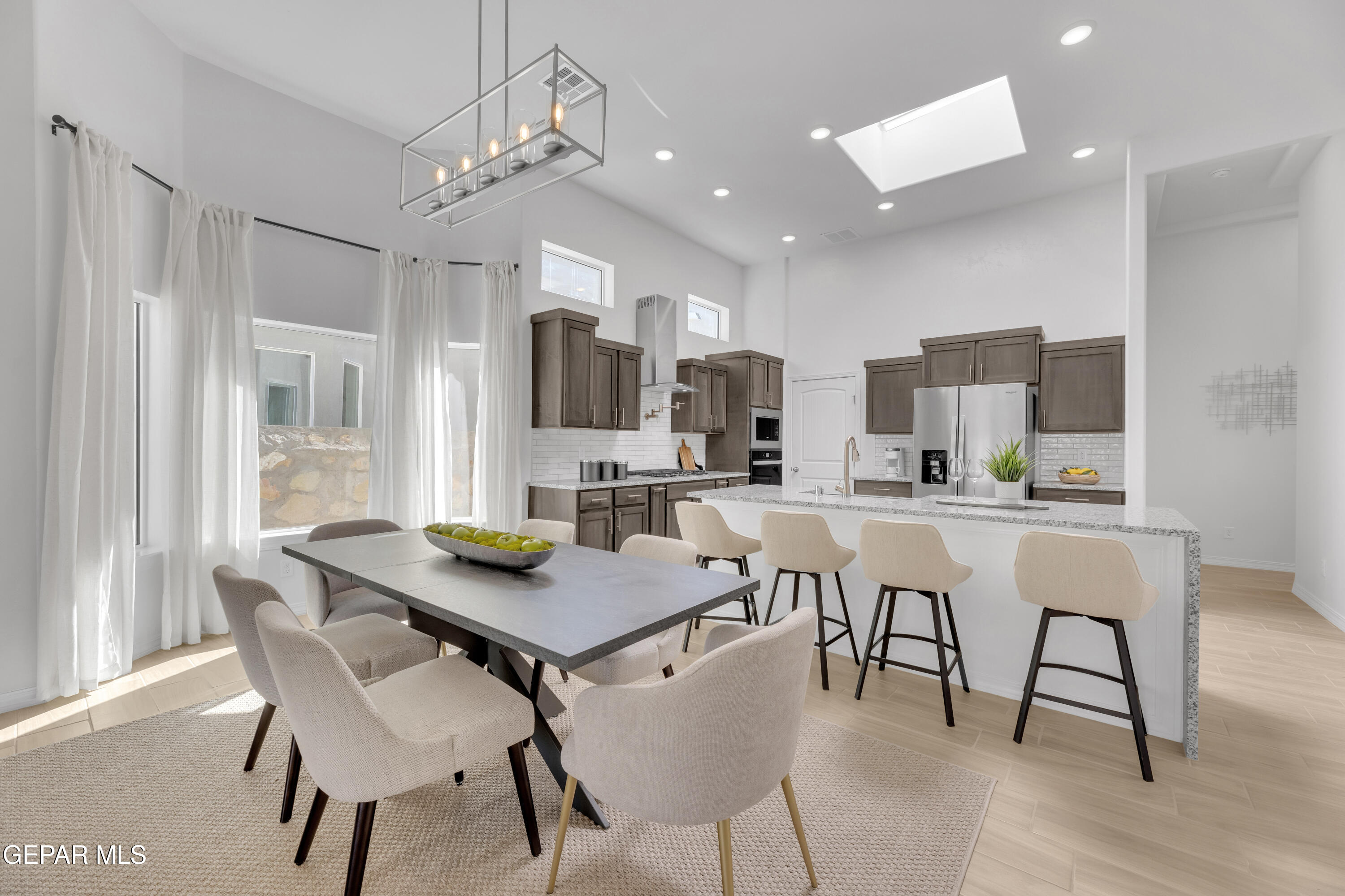 15300 Conviction El Paso, TX 79938 - Photo 23 of 44 a view of a dining room with furniture and wooden floor