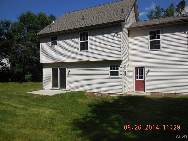 402 Mountain Road Albrightsville, PA 18210 - Photo 11 of 11 a house that has a big yard in front of it