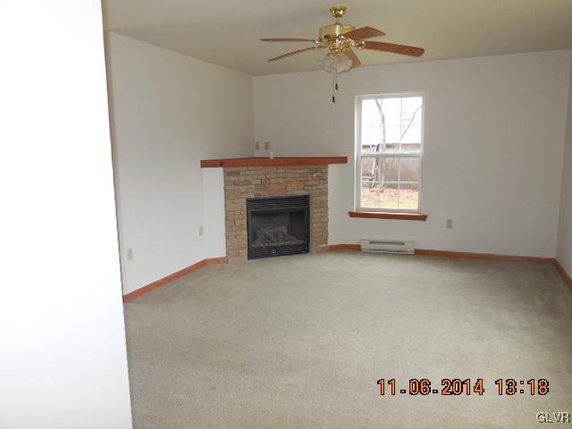 402 Mountain Road Albrightsville, PA 18210 - Photo 2 of 11 a view of an empty room with a window