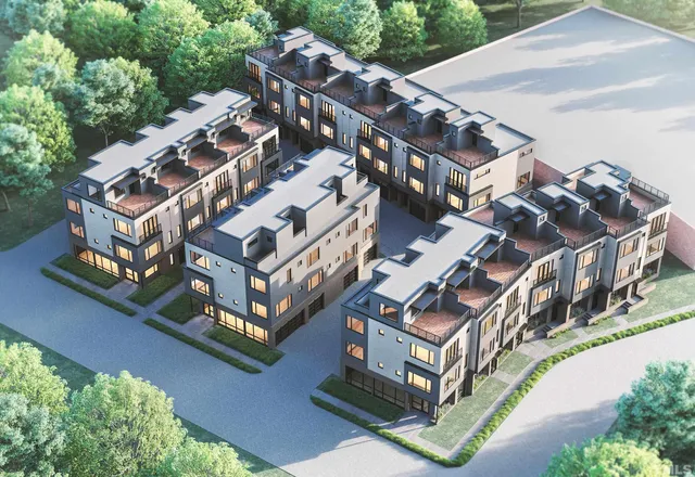 a kitchen with stainless steel appliances a table chairs refrigerator and window