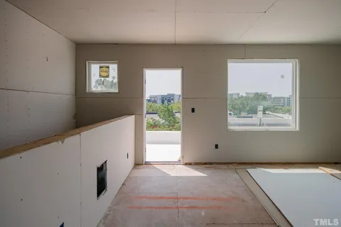 a view of a room that has a window in it