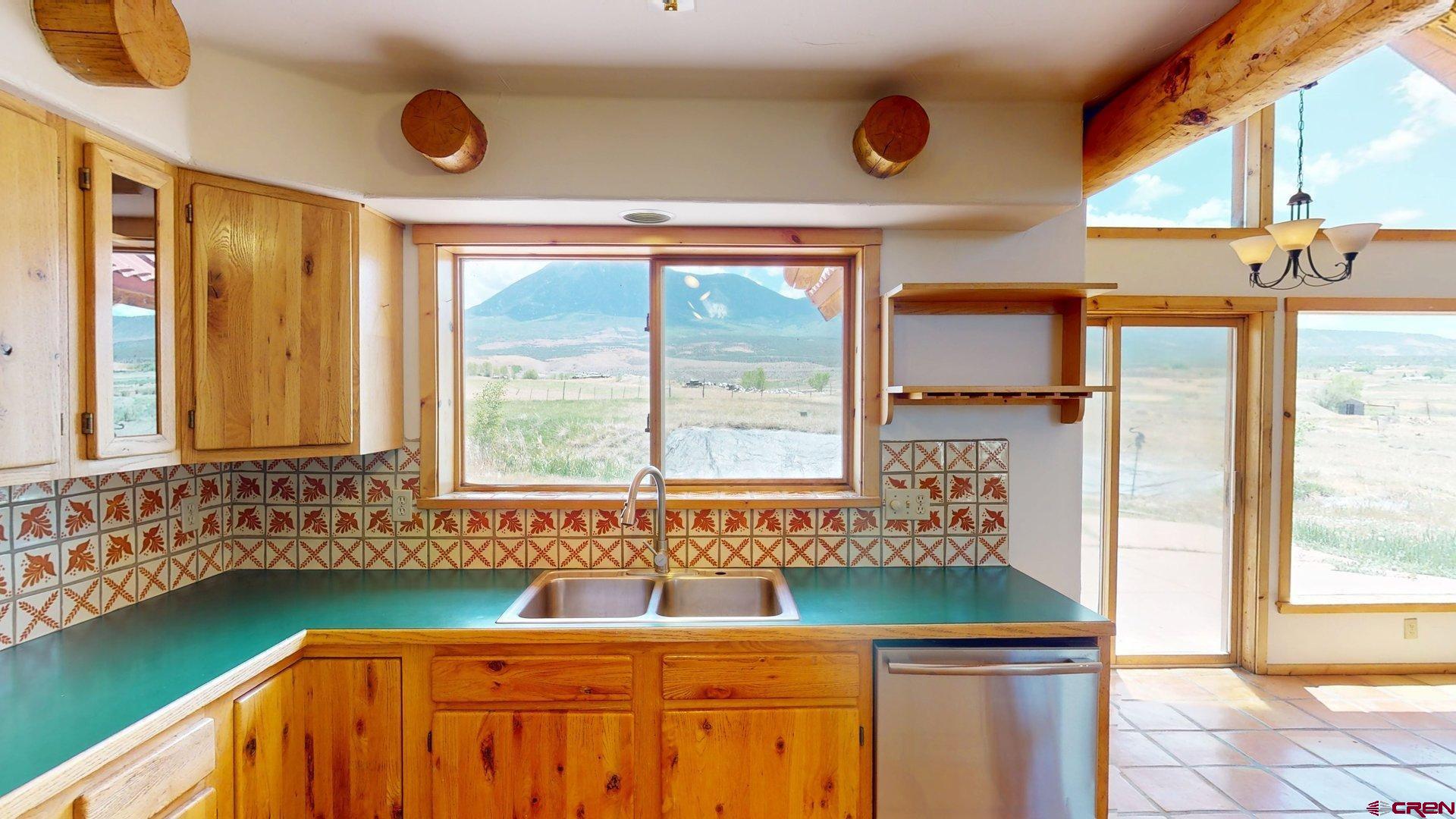 40557 M75 Road Paonia, CO 81428 - Photo 8 of 34 a bathroom with a sink and a large window