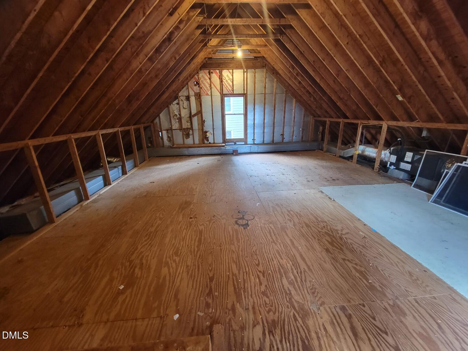 105 Leeward Court Cary, NC 27511 - Photo 24 of 27 a view of an empty room with wooden floor and windows