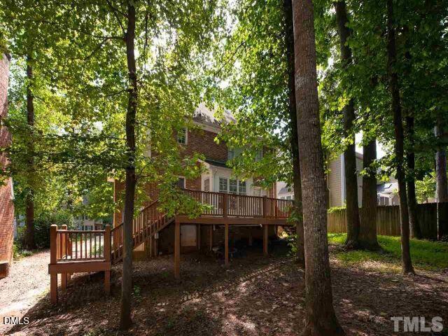 105 Leeward Court Cary, NC 27511 - Photo 27 of 27 a view of a lake with a tree