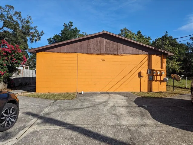 a view of a house with a street
