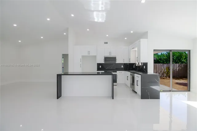 $898,500 | 7045 Southwest 83rd Place, Miami, FL 33143