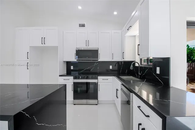 $898,500 | 7045 Southwest 83rd Place, Miami, FL 33143