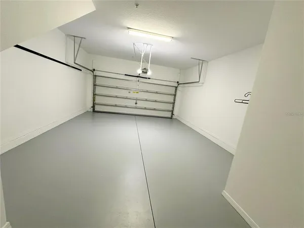 a view of a room with racks on the wall