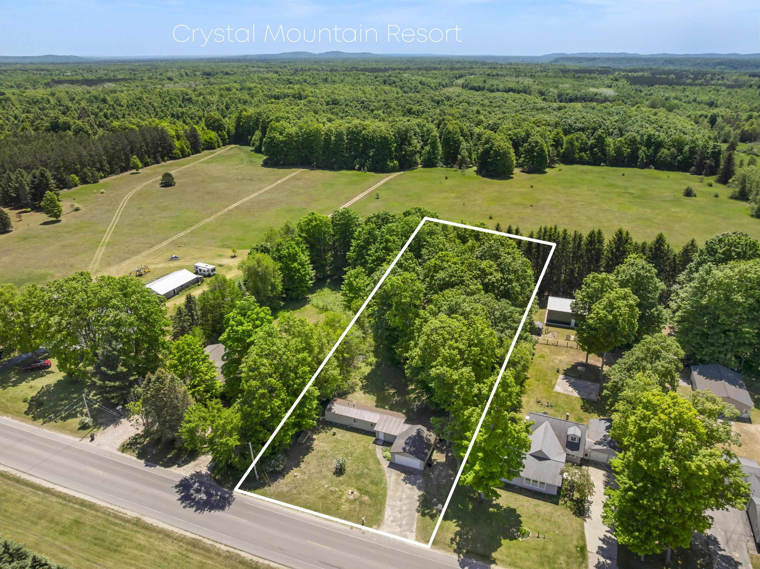 9077 Homestead Road Benzonia, MI 49616 - Photo 2 of 16