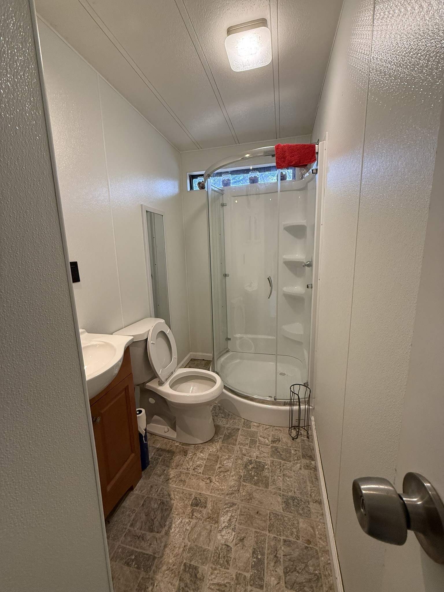 188 North Dogwood Street Trinity, TX 75862 - Photo 3 of 9 a bathroom with a toilet and a shower