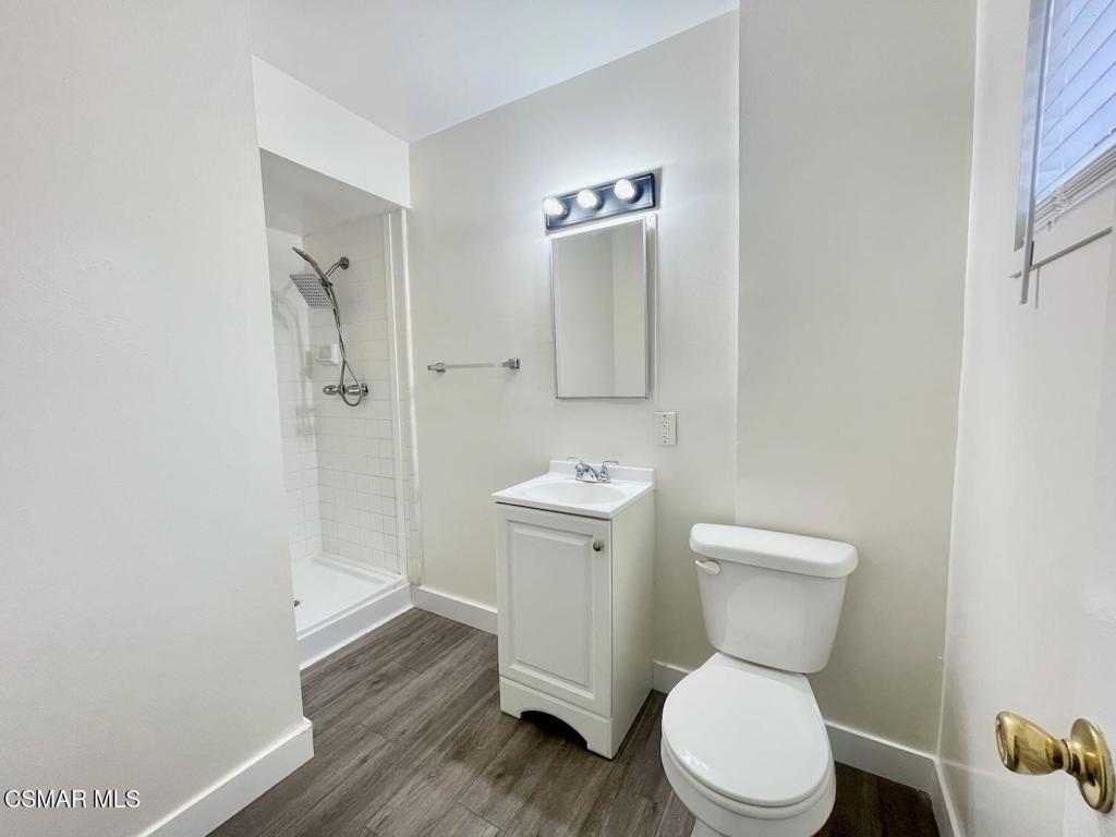 4120 Hi Drive Simi Valley, CA 93063 - Photo 22 of 29 a white toilet sitting next to a bathroom sink