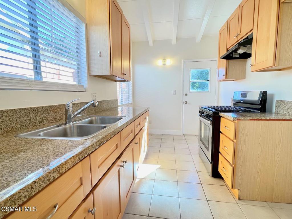 4120 Hi Drive Simi Valley, CA 93063 - Photo 6 of 29 a kitchen with stainless steel appliances granite countertop a sink and cabinets