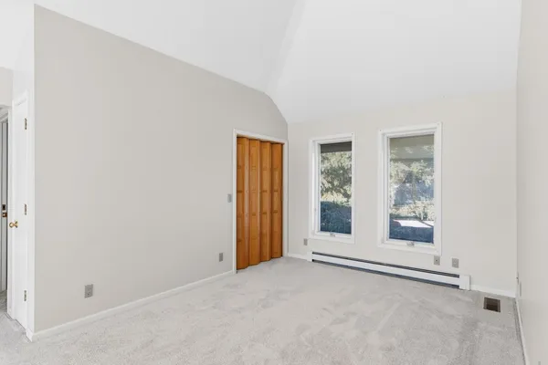an empty room with windows