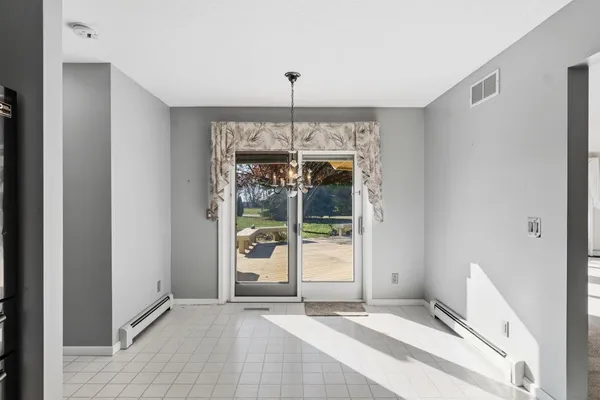 a view of an empty room with window