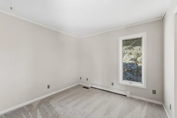 an empty room with sliding door