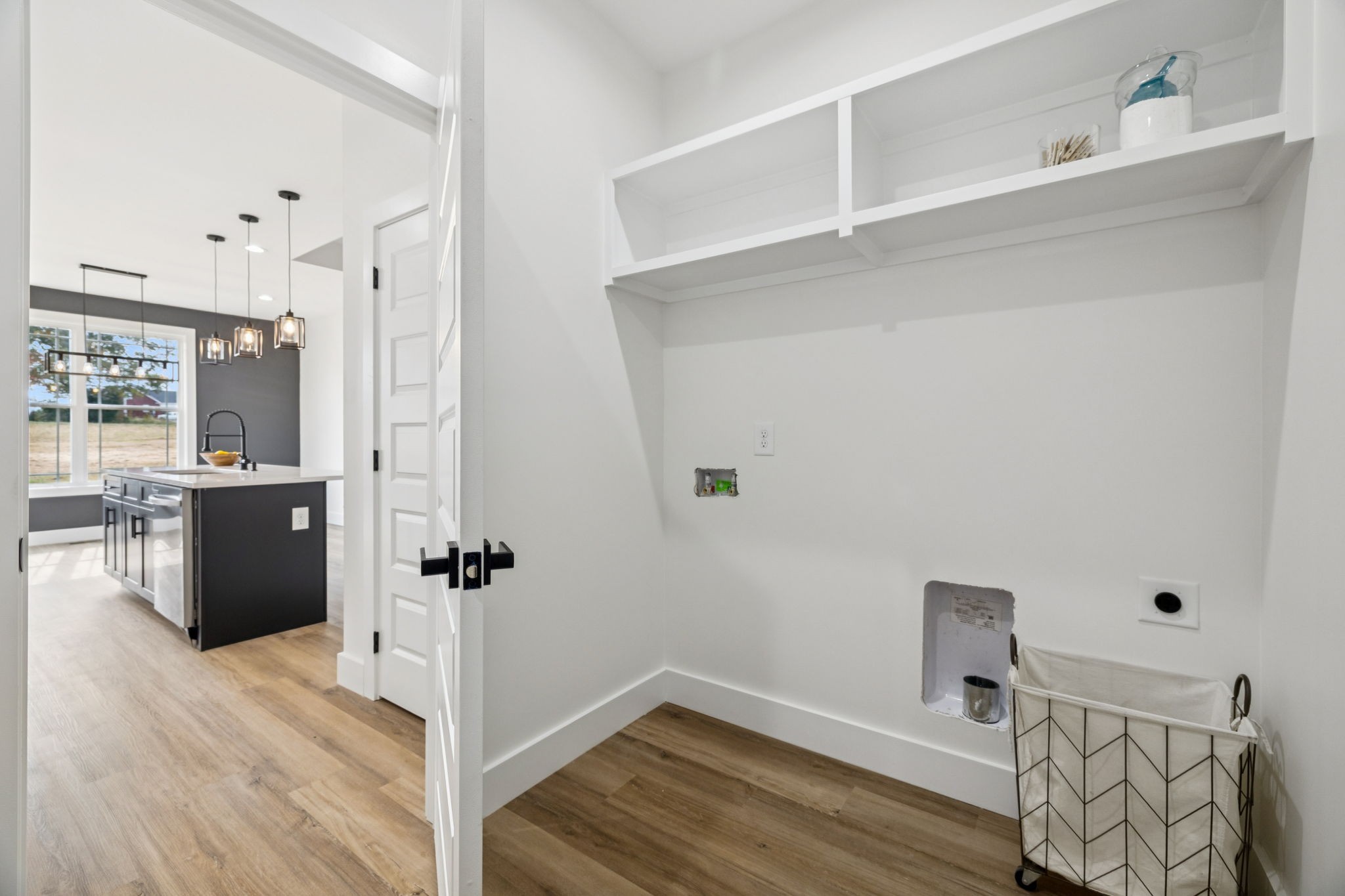 6437 Hopewell Road Springfield, TN 37172 - Photo 33 of 87 a view of a hallway with wooden floor and staircase