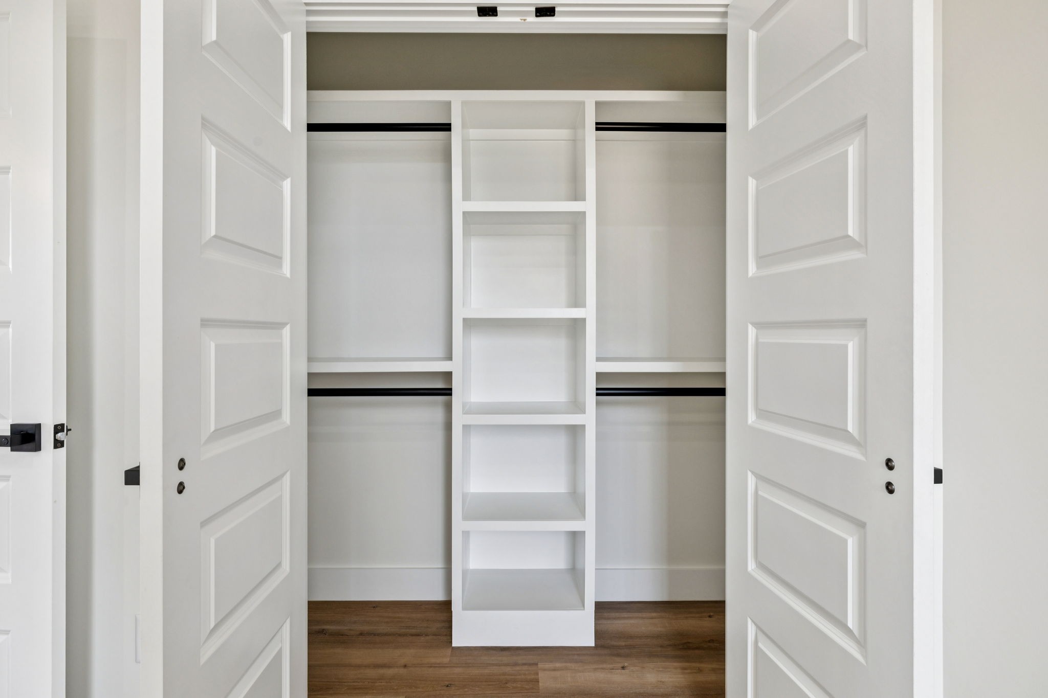 6437 Hopewell Road Springfield, TN 37172 - Photo 48 of 87 a view of walk in closet with wooden floor