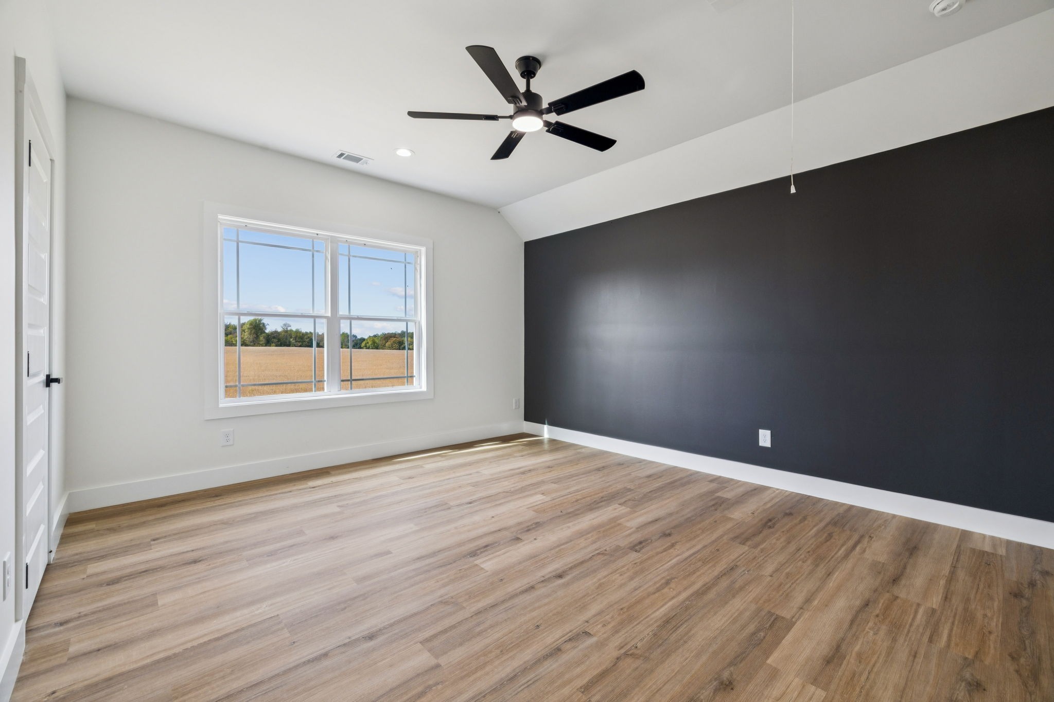 6437 Hopewell Road Springfield, TN 37172 - Photo 56 of 87 wooden floor in an empty room with a window